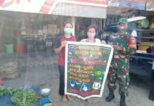 Koramil Sengah Temila Terus Serukan Penegakan 3M dan PPKM di Pasar Pahauman