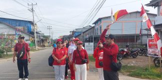 Desa Hilir Tengah Ngabang Gelar Jalan Sehat Meriahkan HUT RI Ke – 80