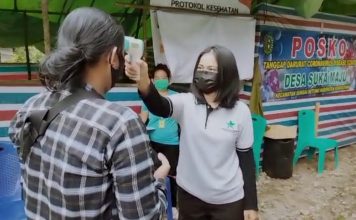 Satgas Covid-19 Desa Perketat Keluar Masuk Orang di Jalan Bukit Vandering