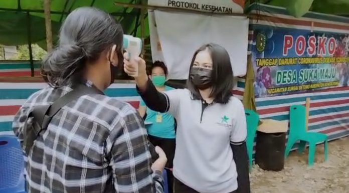 Satgas Covid-19 Desa Perketat Keluar Masuk Orang di Jalan Bukit Vandering