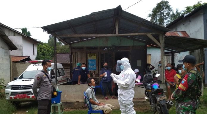 Kontak Erat Dengan Pasien Covid-19, Sepuluh Warga Desa Caokng Jalani Tes Swab