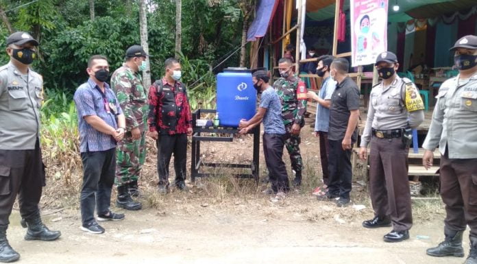 Pastikan Prokes Diterapkan, Koramil Air Besar Pantau Resepsi Pernikahan
