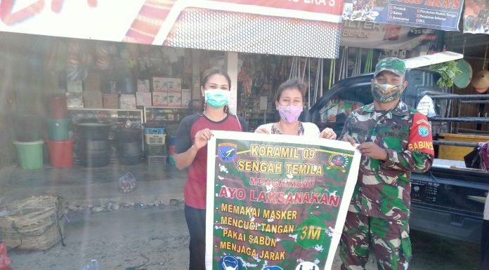 Koramil Sengah Temila Terus Serukan Penegakan 3M dan PPKM di Pasar Pahauman