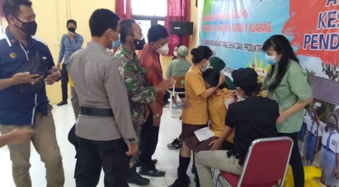 Peran Babinsa dan Bhabinkamtibmas Dalam Pengawalan Vaksinasi Covid-19