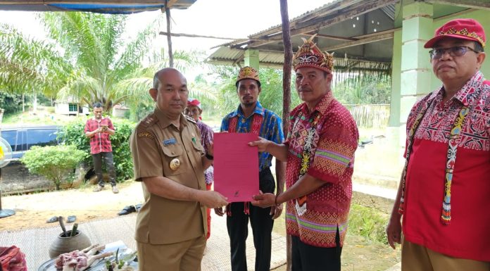 Pj Bupati Landak: Timanggong Perpanjangan Tangan Dari Pemerintah dan Aparat Keamanan