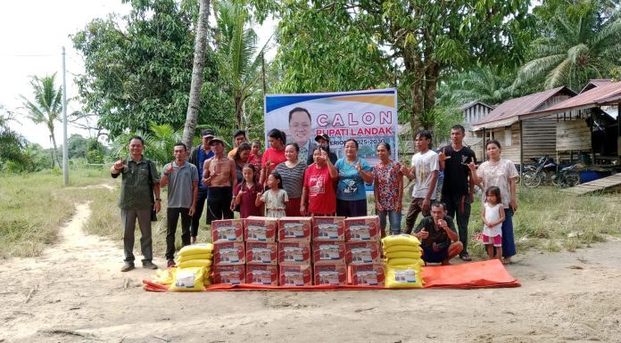 Relawan Andreas Lani Salurkan Bantuan Banjir di Temiang Sawi
