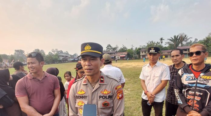 Kapolsek Kuala Behe Dukung Open Turnamen Sepak Bola sebagai Ajang Prestasi Hingga Kancah Nasional